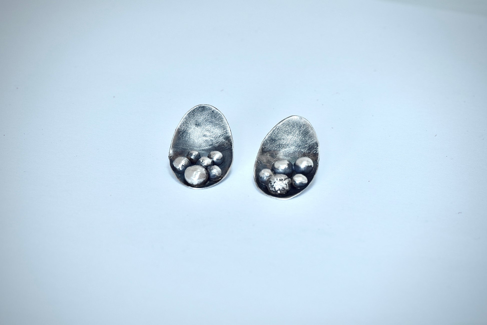 RIVETED SPHERE | Asymmetric Sterling Silver Earrings