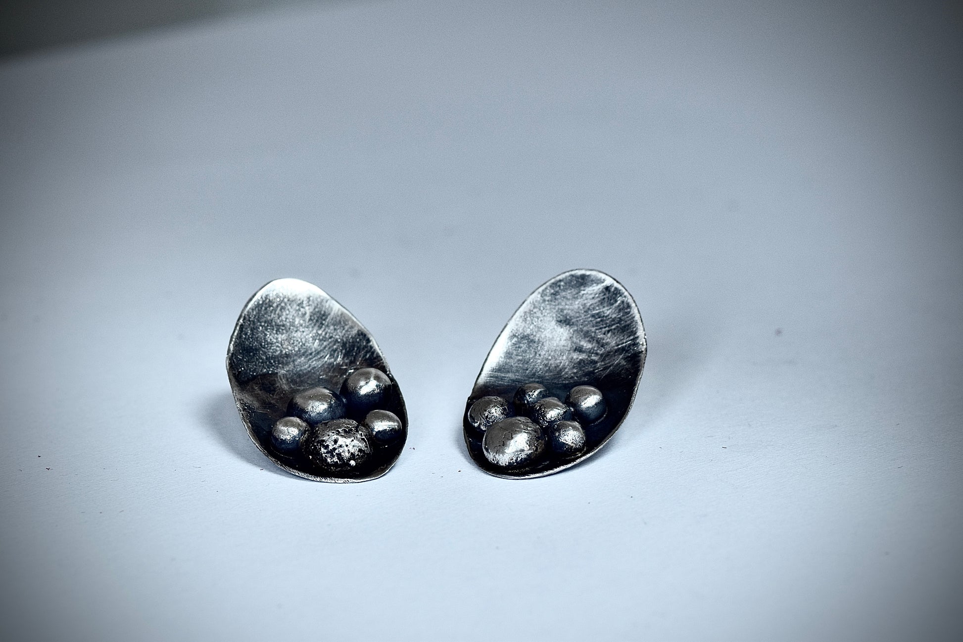 RIVETED SPHERE | Asymmetric Sterling Silver Earrings